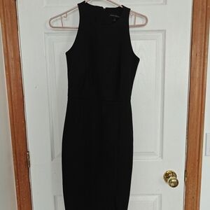 Banana Republic black sleeveless sheath dress with a side slit, size 2